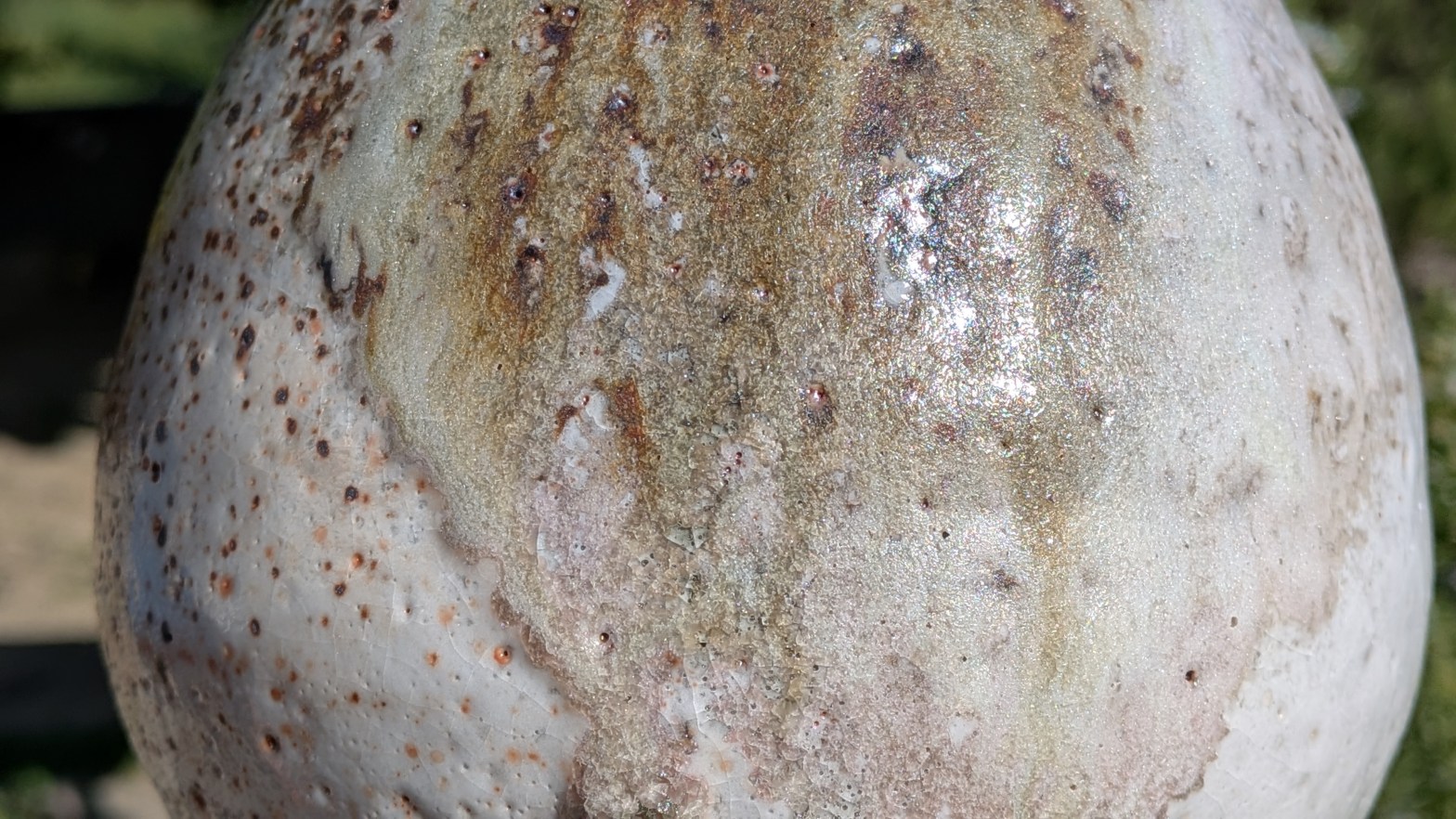 pot with ash sprinkled over shino glaze