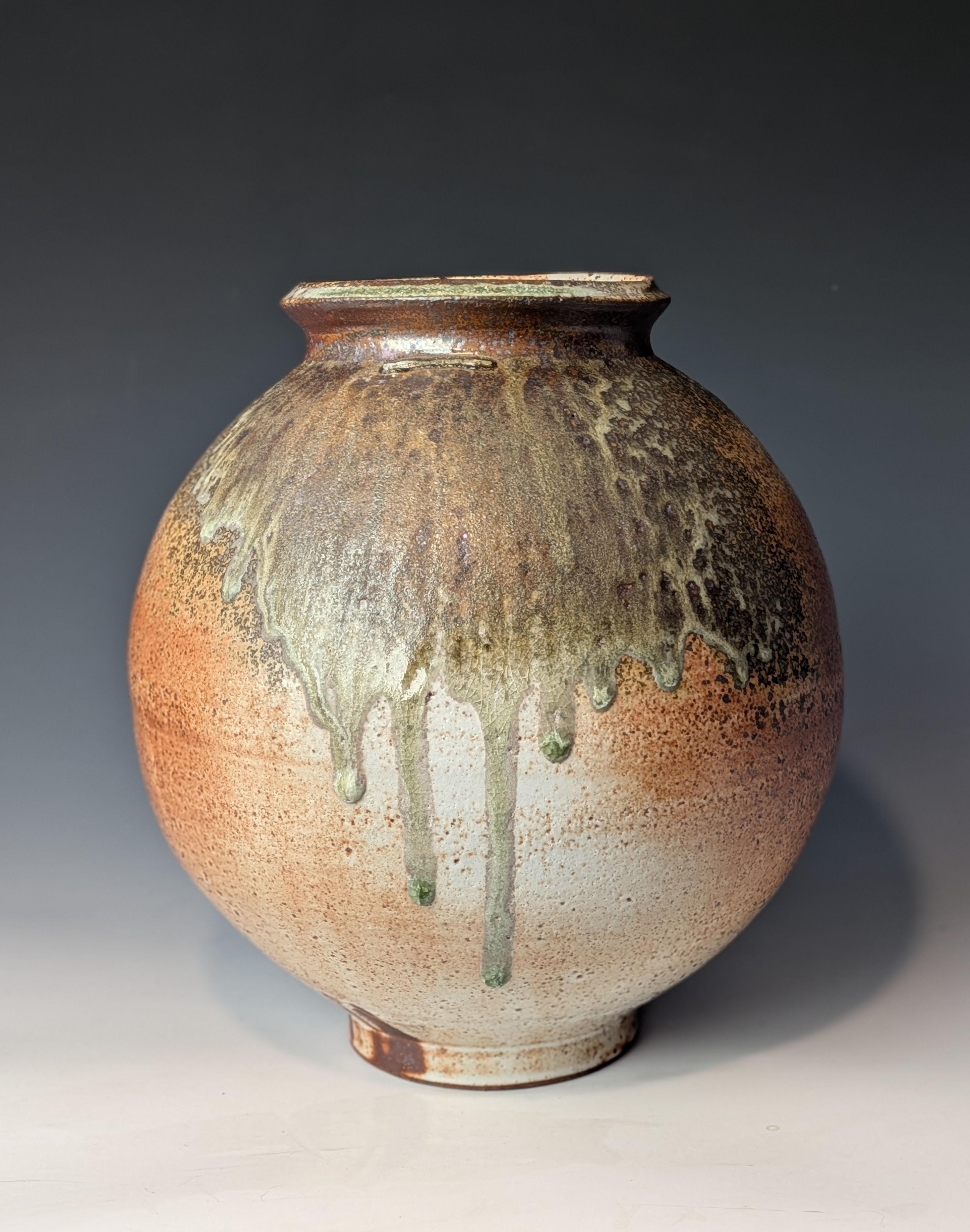 Shino glazed moon jar with wood ash