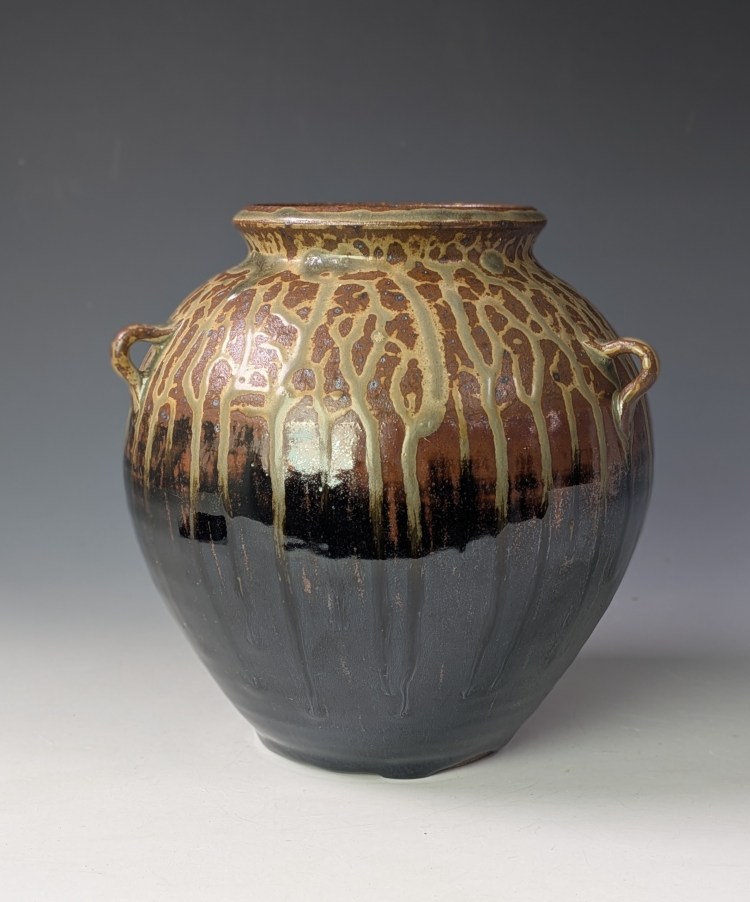 Ceramic jar with lugs and ash and tenmoku glazes